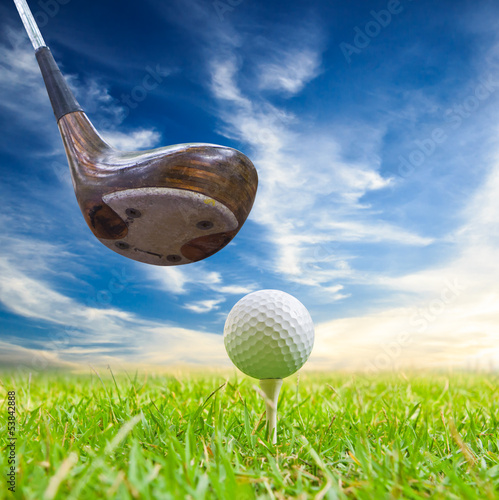 Photo: driver hit golf ball on tee driver hit golf ball on tee