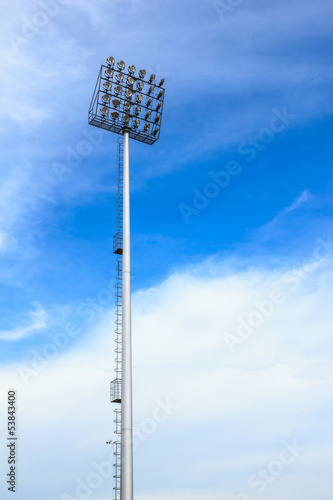 Photo: big spotlight tower at sport arena stadium big spotlight tower at sport arena stadium