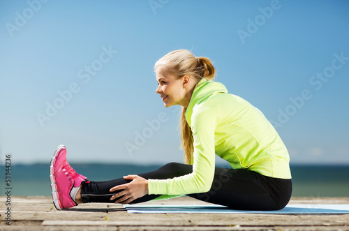 Photo: woman doing sports outdoors woman doing sports outdoors