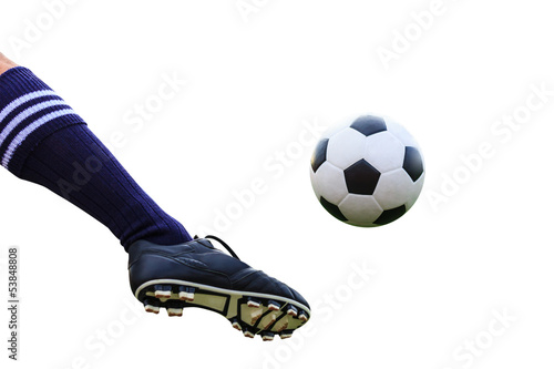 Photo: foot kicking soccer ball isolated with clipping path foot kicking soccer ball isolated with clipping path