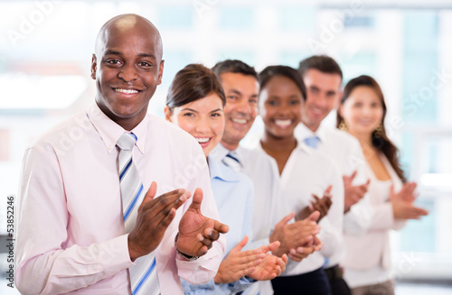 Photo: Successful business team applauding Successful business team applauding