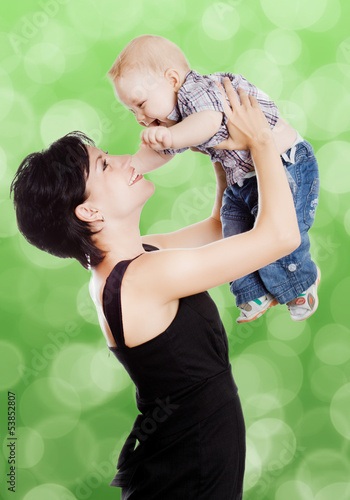 Photo: Beautiful happy mother with attractive baby Beautiful happy mother with attractive baby