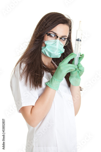 Photo: Doctor woman with medical syringe. young female doctor with syri Doctor woman with medical syringe. young female doctor with syri