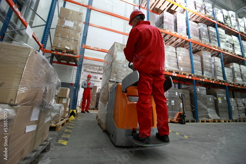 Photo: delivery of goods in large storehouse delivery of goods in large storehouse