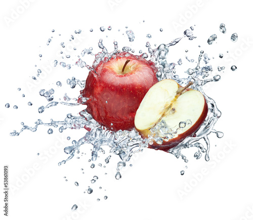 Photo: Apple in spray of water. Apple in spray of water.