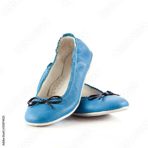 Photo: blue dress shoes. children's shoes isolated on a white backgrou blue dress shoes. children's shoes isolated on a white backgrou
