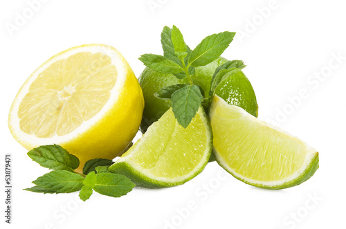 Photo: Lime,lemon and fresh leaves of mint on white Lime,lemon and fresh leaves of mint on white