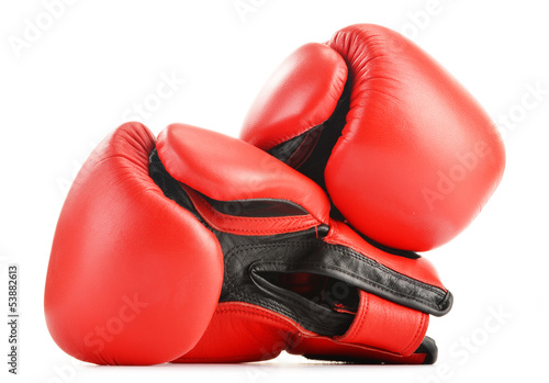 Photo: Pair of red leather boxing gloves isolated on white Pair of red leather boxing gloves isolated on white