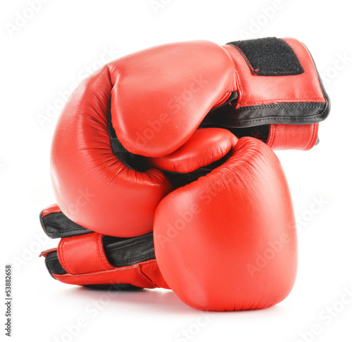 Photo: Pair of red leather boxing gloves isolated on white Pair of red leather boxing gloves isolated on white