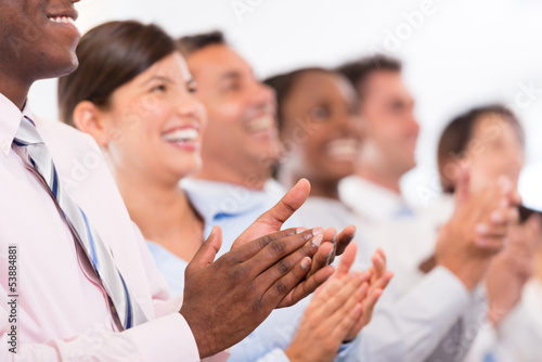Photo: Happy business group applauding Happy business group applauding