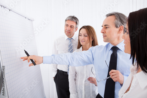 Photo: Businesspeople Discussing Project Businesspeople Discussing Project
