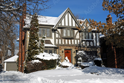 Photo: snow covered house in winter snow covered house in winter