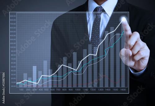 Photo: financial symbols coming from hand financial symbols coming from hand