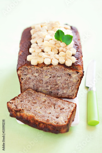 Photo: Banana bread with walnuts, selective focus Banana bread with walnuts, selective focus