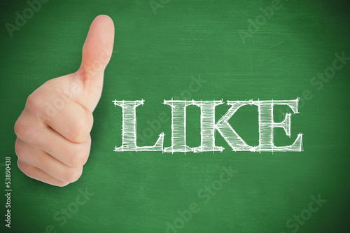 Photo: Thumb up representing social network logo on green background Thumb up representing social network logo on green background