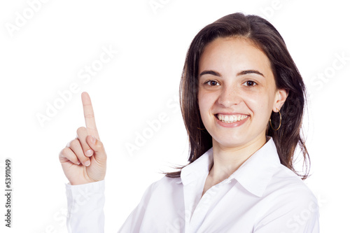Photo: Happy smiling woman pointing up with her finger - isolated over Happy smiling woman pointing up with her finger - isolated over