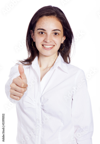 Photo: Young woman showing thumb up sign isolated on white background Young woman showing thumb up sign isolated on white background