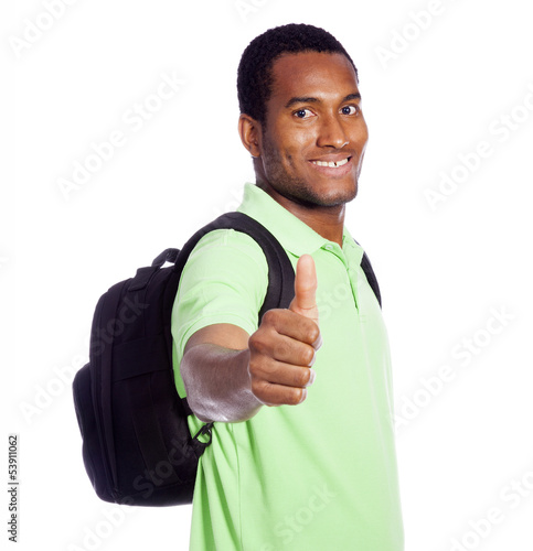 Photo: African American student thumb up - isolated over a white backgr African American student thumb up - isolated over a white backgr