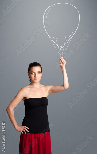 Photo: Beautiful woman holding balloon drawing Beautiful woman holding balloon drawing
