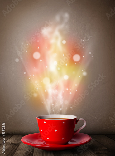 Photo: Coffee mug with abstract steam and colorful lights Coffee mug with abstract steam and colorful lights