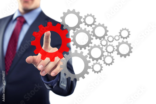 Photo: Businessman with cogwheels Businessman with cogwheels