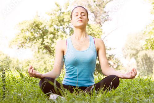 Photo: Beautiful young woman doing yoga Beautiful young woman doing yoga