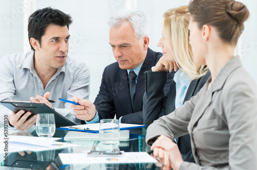 Photo: Business People In Meeting Business People In Meeting