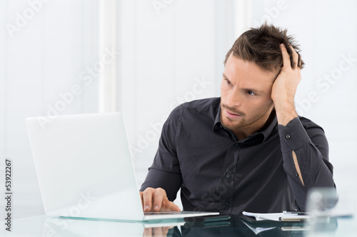Photo: Stressed and Worried Businessman Stressed and Worried Businessman