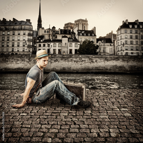 Photo: Retro photo of young handsome man traveler Retro photo of young handsome man traveler