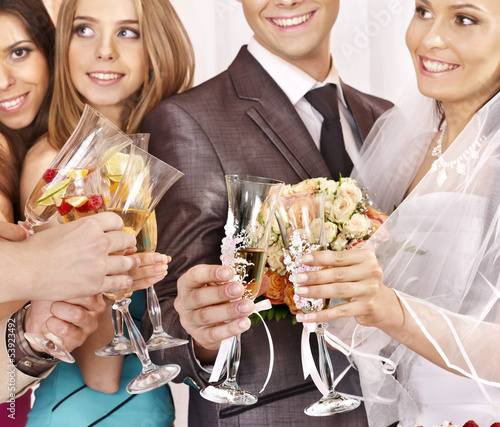 Photo: Hand holding wedding glass. Hand holding wedding glass.