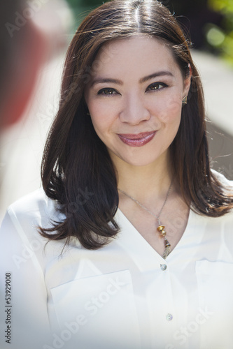 Photo: Smiling Young Asian Woman or Businesswoman Smiling Young Asian Woman or Businesswoman