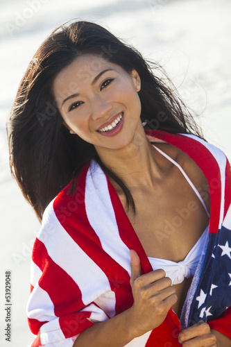 Photo: Beautiful Asian Woman Girl in American Flag on Beach Beautiful Asian Woman Girl in American Flag on Beach