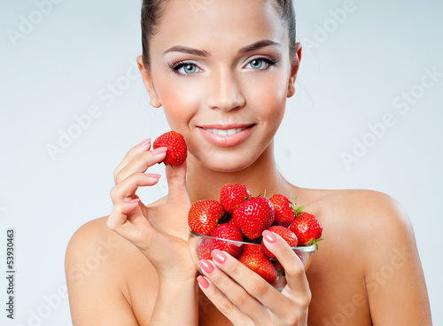 Photo: cheerful girl with strawberries cheerful girl with strawberries
