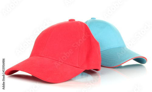 Photo: Red and blue caps cap isolated on white Red and blue caps cap isolated on white