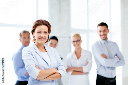 Photo: businesswoman in office businesswoman in office