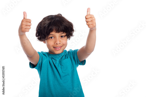 Photo: Cute mixed race boy with thumbs up pose, isolated in studio. Cute mixed race boy with thumbs up pose, isolated in studio.
