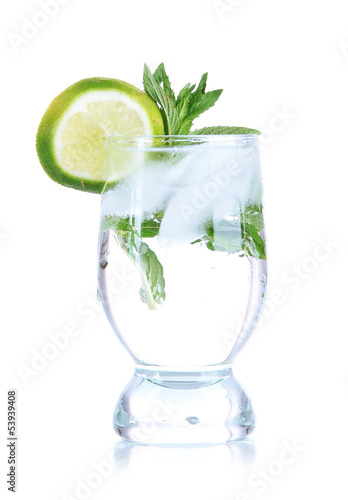 Photo: Glass of cocktail with ice isolated on white Glass of cocktail with ice isolated on white
