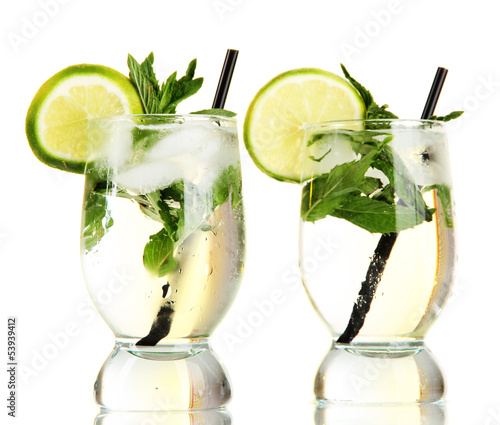 Photo: Glasses of cocktail with ice isolated on white Glasses of cocktail with ice isolated on white