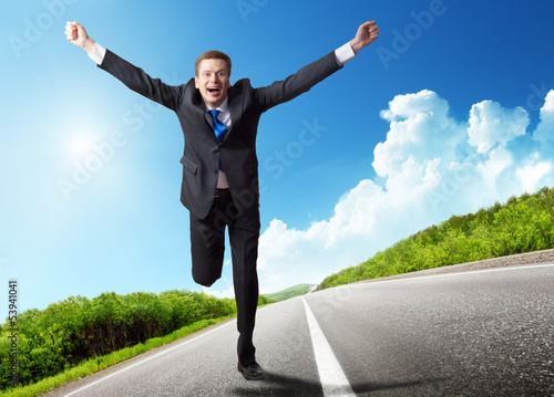 Photo: business man run on the road business man run on the road