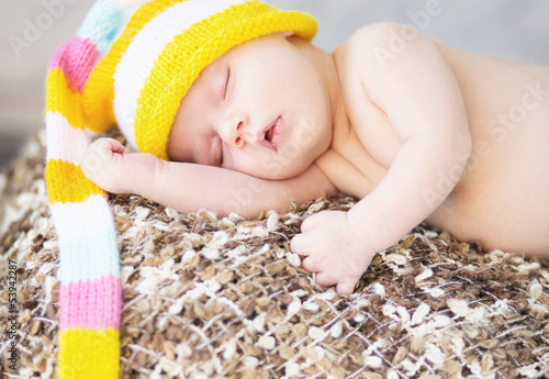 Photo: Picture of sleeping baby with woollen cap Picture of sleeping baby with woollen cap