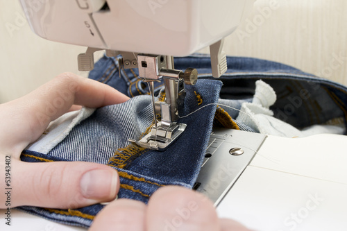 Photo: Sewing machine with needle Sewing machine with needle