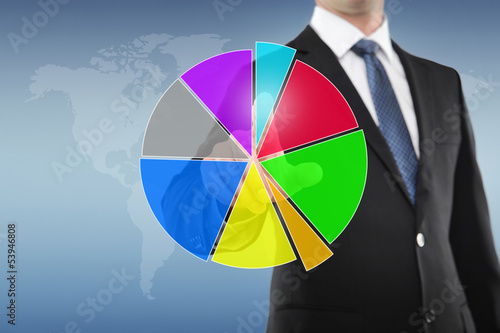 Photo: Businessman with Pie Chart Businessman with Pie Chart