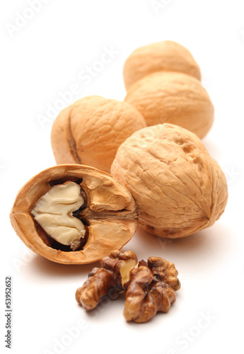 Photo: Heap of walnuts on white Heap of walnuts on white