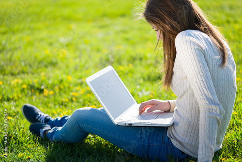 Photo: girl with laptop girl with laptop