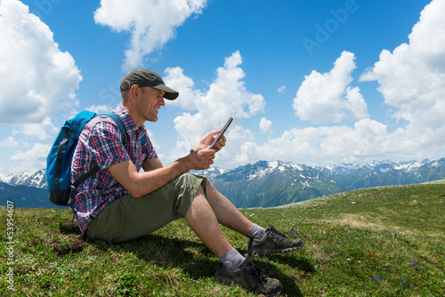 Photo: man with tablet computer man with tablet computer