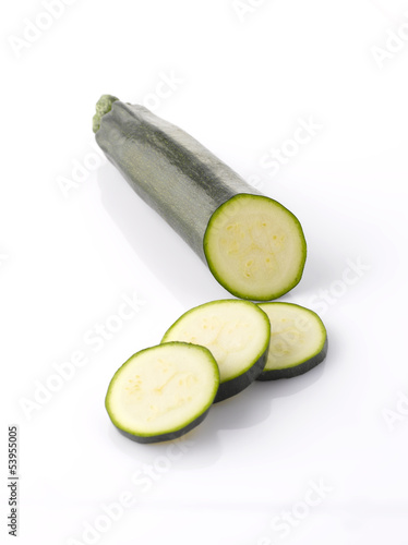 Photo: Two fresh zucchini isolated on white Two fresh zucchini isolated on white