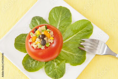 Photo: Quinoa Stuffed Tomato with Spinach Leaves Quinoa Stuffed Tomato with Spinach Leaves