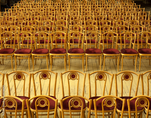 Photo: Empty rows of chairs in the concert hall Empty rows of chairs in the concert hall