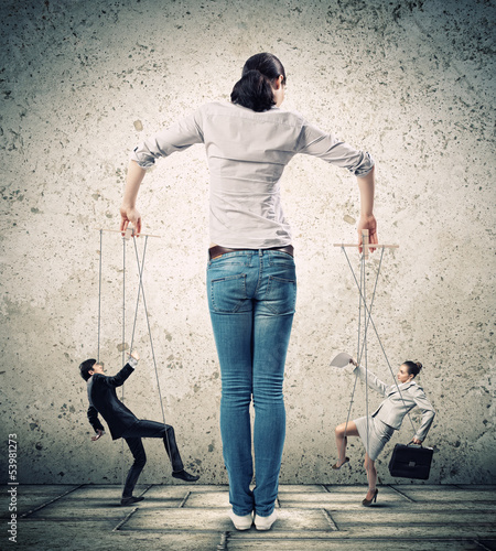Photo: Businesswoman puppeteer Businesswoman puppeteer