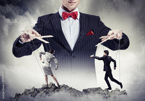 Photo: Businessman puppeteer Businessman puppeteer